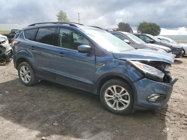 Photo 4 from auction – 2018 FORD ESCAPE SE with VIN 1FMCU0GD7JUB59906