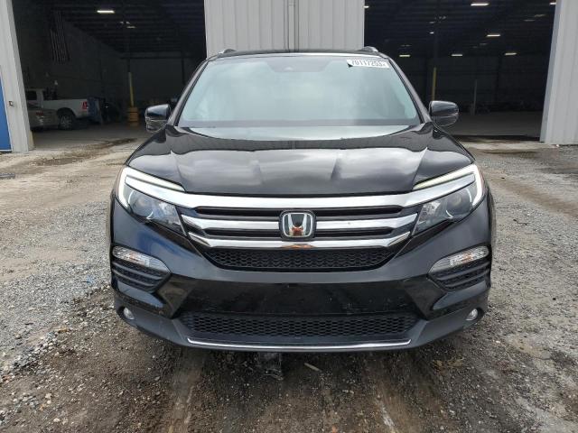 Photo 5 from auction – 2016 HONDA PILOT TOUR with VIN 5FNYF5H97GB054375