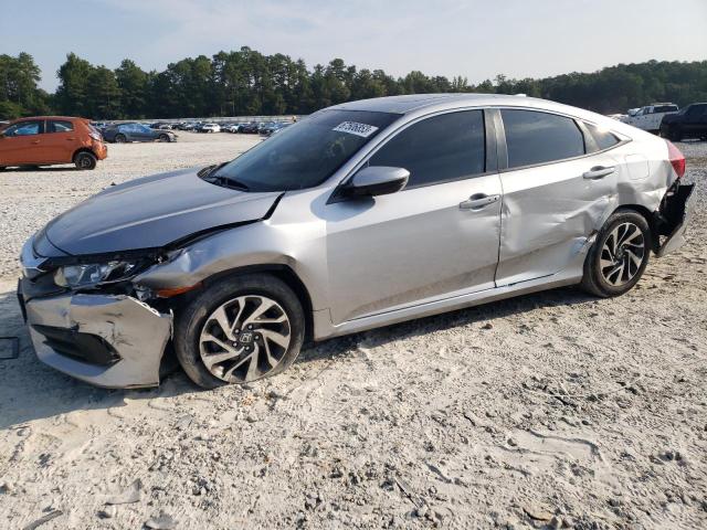HONDA CIVIC EX 2018 with VIN 19XFC2F7XJE023201 - Photo from auction