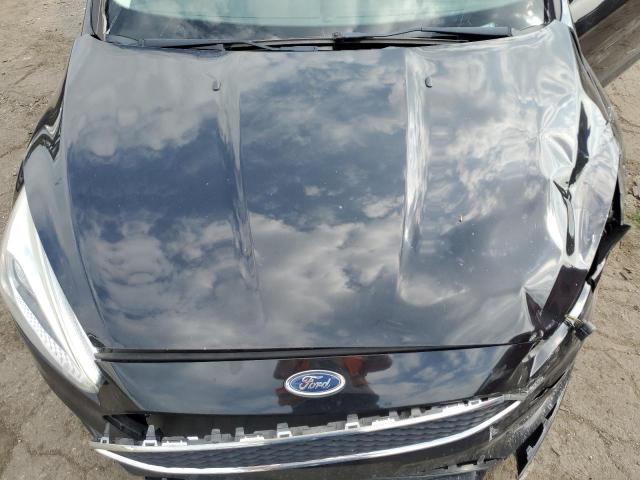 Photo 11 from auction – 2016 FORD FOCUS SE with VIN 1FADP3K25GL244349