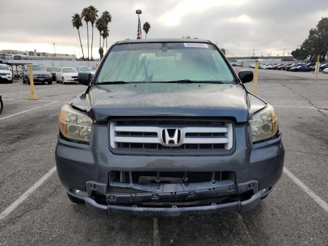 Photo 5 from auction – 2006 HONDA PILOT EX with VIN 5FNYF28606B038540