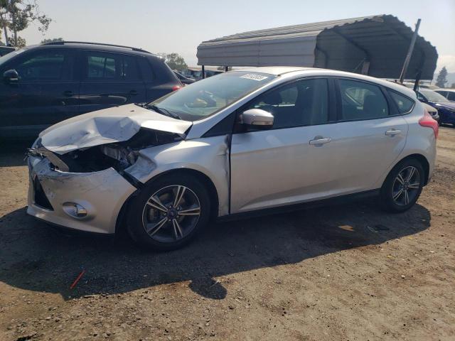FORD FOCUS SE 2014 with VIN 1FADP3K21EL156878 - Photo from auction