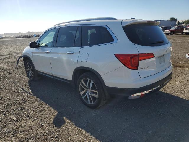 Photo 2 from auction – 2018 HONDA PILOT ELIT with VIN 5FNYF6H04JB060679