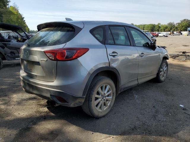Photo 3 from auction – 2014 MAZDA CX-5 SPORT with VIN JM3KE2BE8E0400692