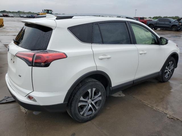 Photo 3 from auction – 2018 TOYOTA RAV4 LE with VIN JTMZFREV2JJ740398