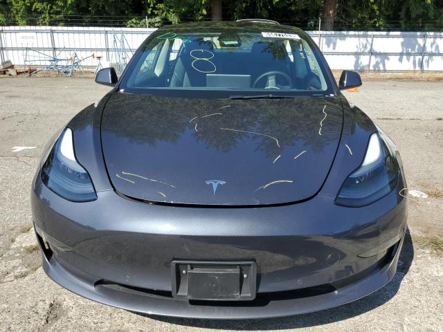 Photo 5 from auction – 2022 TESLA MODEL 3 with VIN 5YJ3E1EB8NF287207