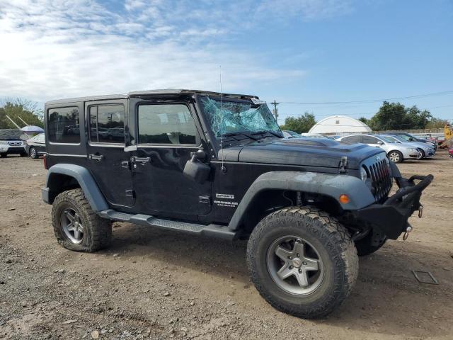 Photo 4 from auction – 2014 JEEP WRANGLER U with VIN 1C4BJWDG1EL208328
