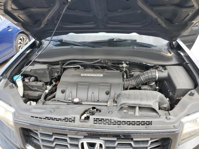 Photo 11 from auction – 2014 HONDA RIDGELINE with VIN 5FPYK1F73EB002767