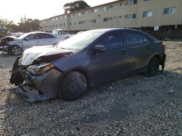 TOYOTA COROLLA L 2014 with VIN 5YFBURHE1EP119951 - Photo from auction