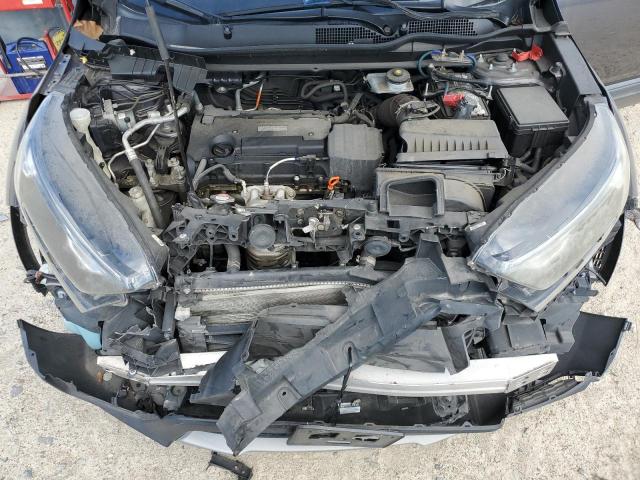 Photo 12 from auction – 2017 HONDA CR-V LX with VIN 7FARW5H31HE008899