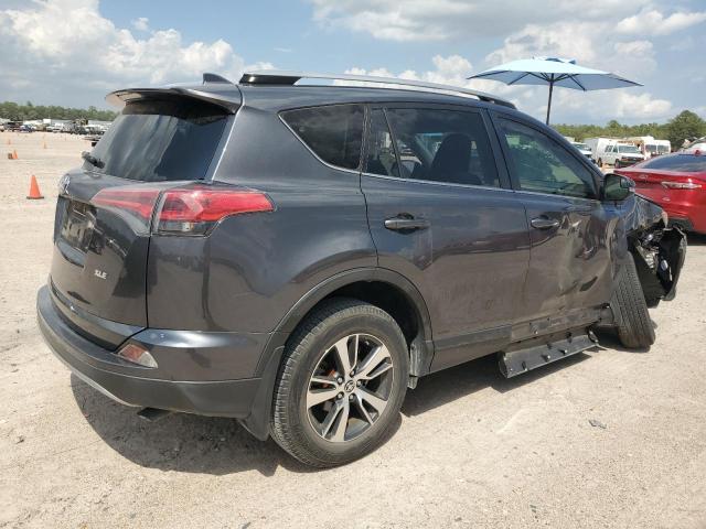 Photo 3 from auction – 2017 TOYOTA RAV4 XLE with VIN JTMWFREV0HD095827