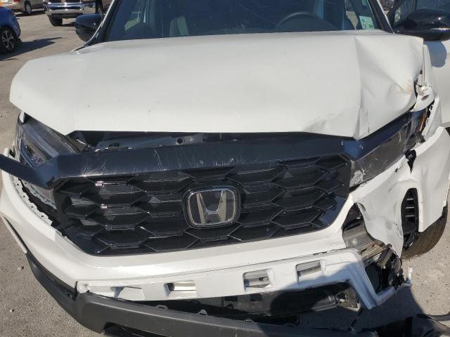 Photo 12 from auction – 2023 HONDA PASSPORT E with VIN 5FNYF8H01PB000346