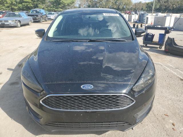Photo 5 from auction – 2015 FORD FOCUS SE with VIN 1FADP3F24FL230015