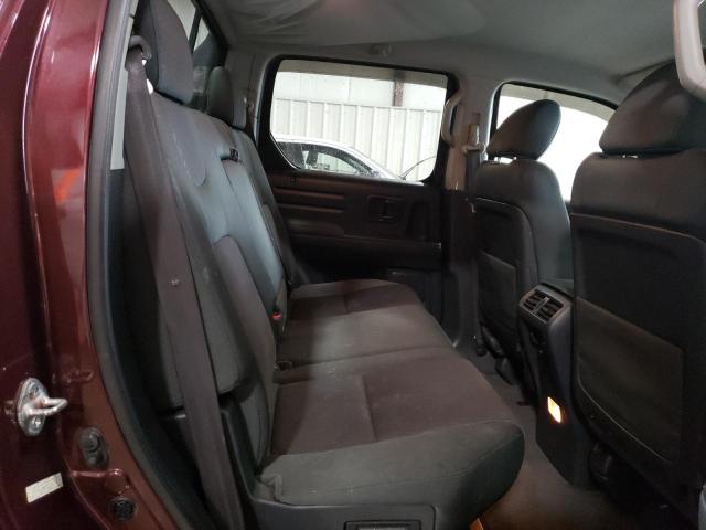 Photo 11 from auction – 2009 HONDA RIDGELINE with VIN 5FPYK16419B104774