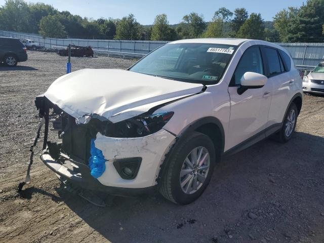MAZDA CX-5 TOURI 2015 with VIN JM3KE4CY4F0446378 - Photo from auction