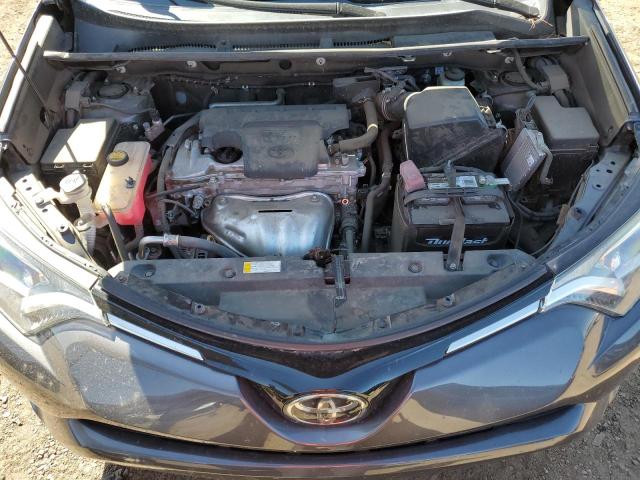 Photo 11 from auction – 2018 TOYOTA RAV4 LE with VIN 2T3BFREV1JW722817