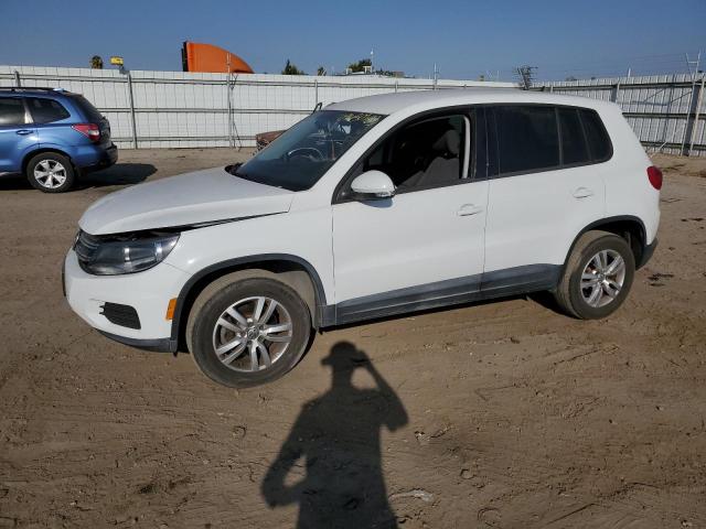 VOLKSWAGEN TIGUAN S 2014 with VIN WVGAV3AX2EW587773 - Photo from auction