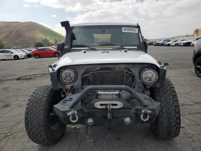 Photo 5 from auction – 2015 JEEP WRANGLER U with VIN 1C4BJWFG7FL743632