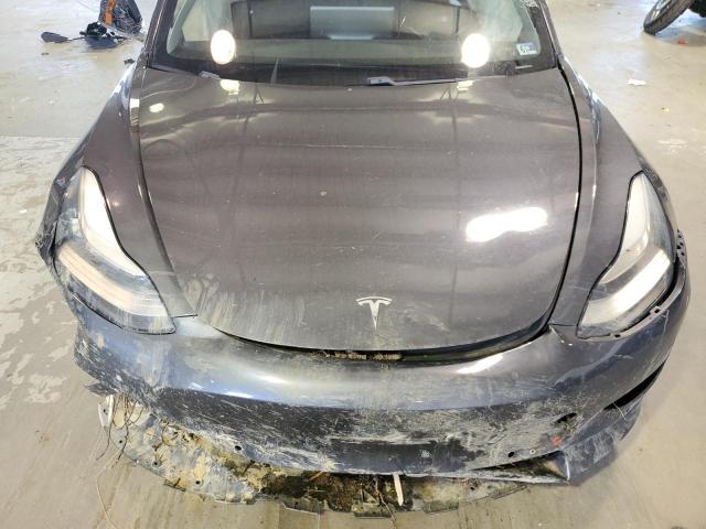 Photo 11 from auction – 2018 TESLA MODEL 3 with VIN 5YJ3E1EA8JF052629