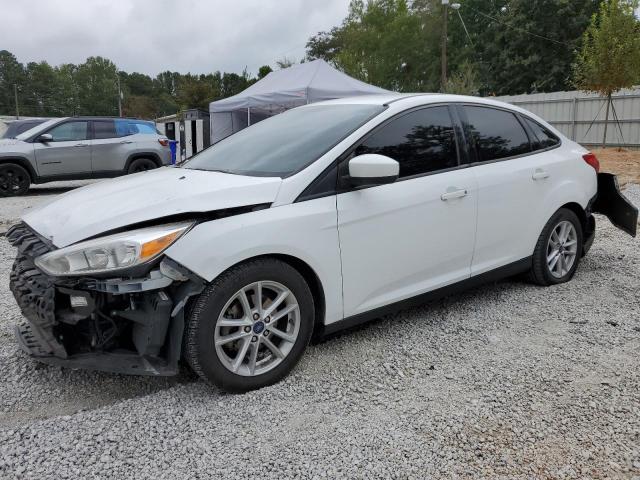 FORD FOCUS SE 2018 with VIN 1FADP3F23JL279800 - Photo from auction