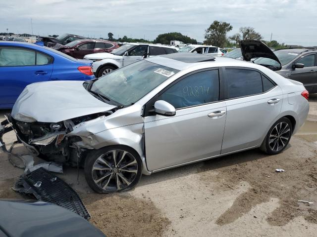 TOYOTA COROLLA L 2018 with VIN 5YFBURHE9JP800773 - Photo from auction