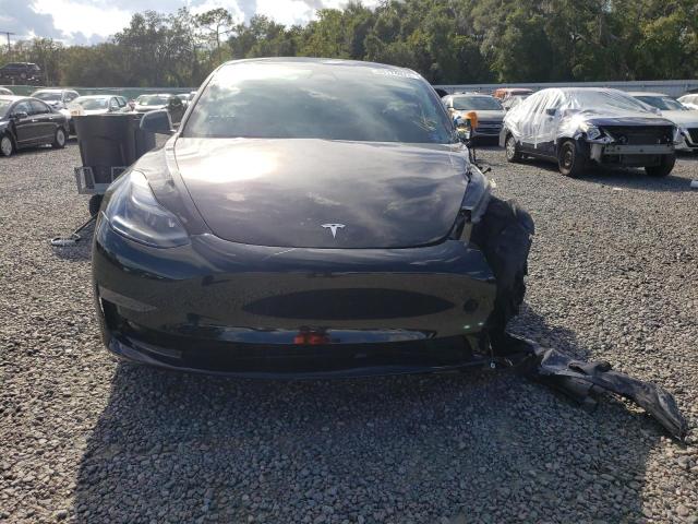 Photo 5 from auction – 2023 TESLA MODEL 3 with VIN 5YJ3E1EC9PF593313