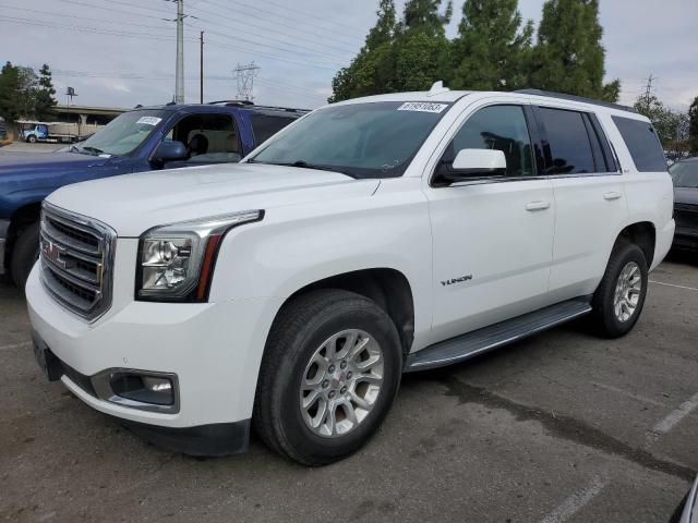 GMC YUKON SLT 2019 with VIN 1GKS2BKC1KR166925 - Photo from auction