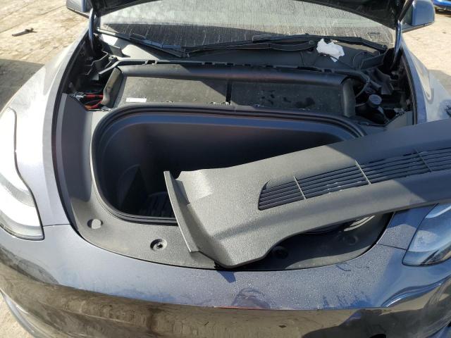 Photo 11 from auction – 2023 TESLA MODEL Y with VIN 7SAYGDEE8PF672283