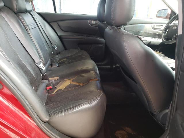 Photo 10 from auction – 2006 KIA OPTIMA LX with VIN KNAGE124565021831
