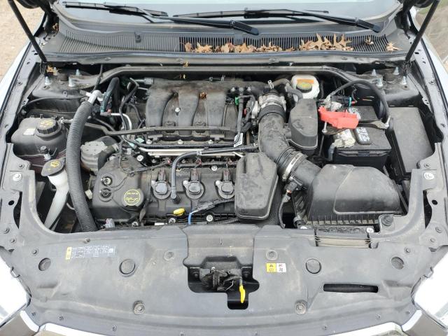 Photo 11 from auction – 2014 FORD TAURUS SEL with VIN 1FAHP2H85EG136942