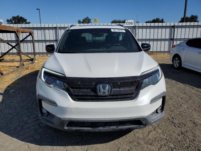 Photo 5 from auction – 2022 HONDA PILOT TRAI with VIN 5FNYF6H86NB072697