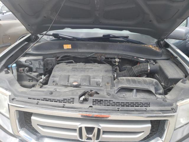 Photo 11 from auction – 2011 HONDA RIDGELINE with VIN 5FPYK1F54BB003341