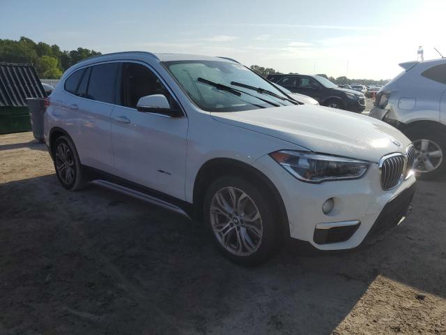 Photo 4 from auction – 2018 BMW X1 XDRIVE2 with VIN WBXHT3C31J5K30428