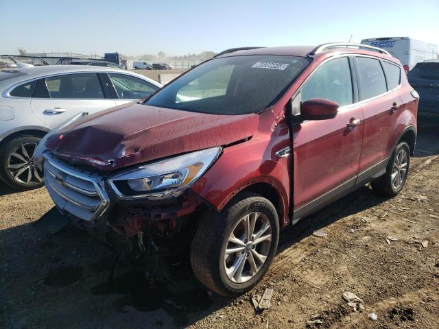 FORD ESCAPE SE 2018 with VIN 1FMCU9GD0JUC33641 - Photo from auction
