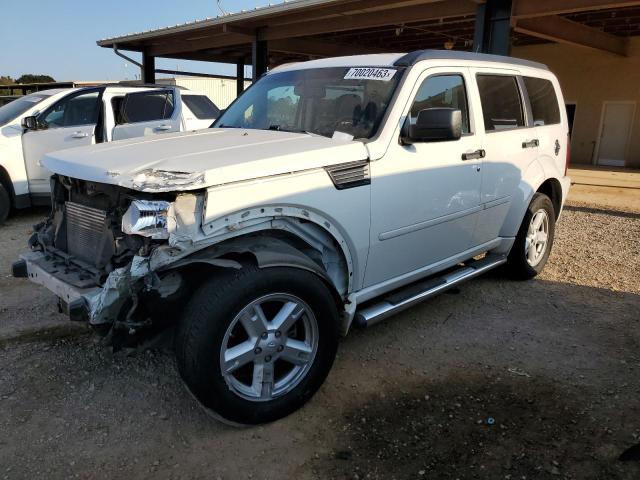 DODGE NITRO SXT 2010 with VIN 1D4PT5GK6AW126262 - Photo from auction