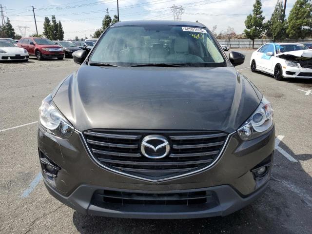 Photo 5 from auction – 2016 MAZDA CX-5 GT with VIN JM3KE2DYXG0775316