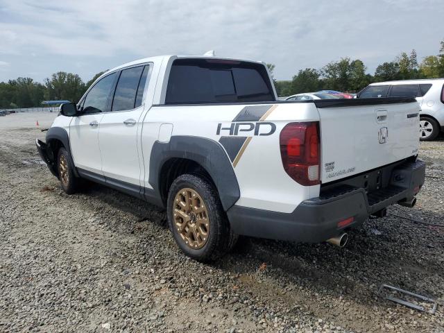 Photo 2 from auction – 2022 HONDA RIDGELINE with VIN 5FPYK3F74NB004975