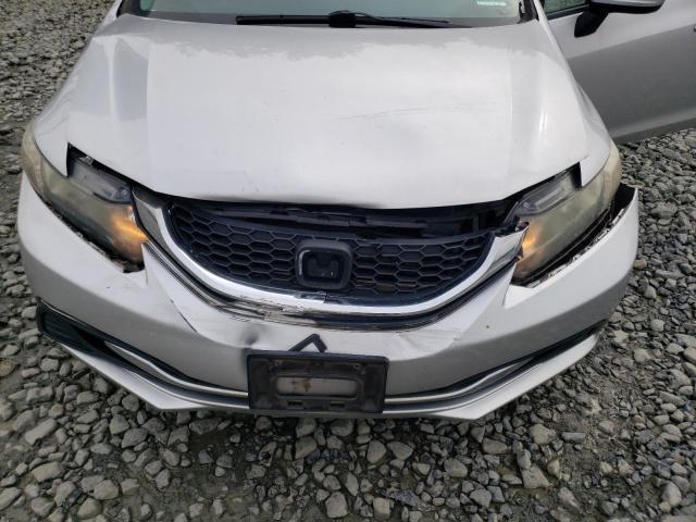 Photo 11 from auction – 2014 HONDA CIVIC LX with VIN 19XFB2F57EE207406