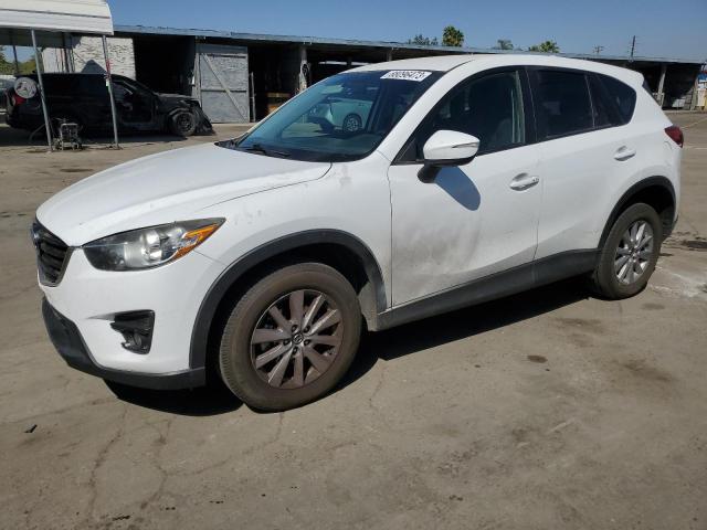 MAZDA CX-5 TOURI 2016 with VIN JM3KE2CY9G0809022 - Photo from auction
