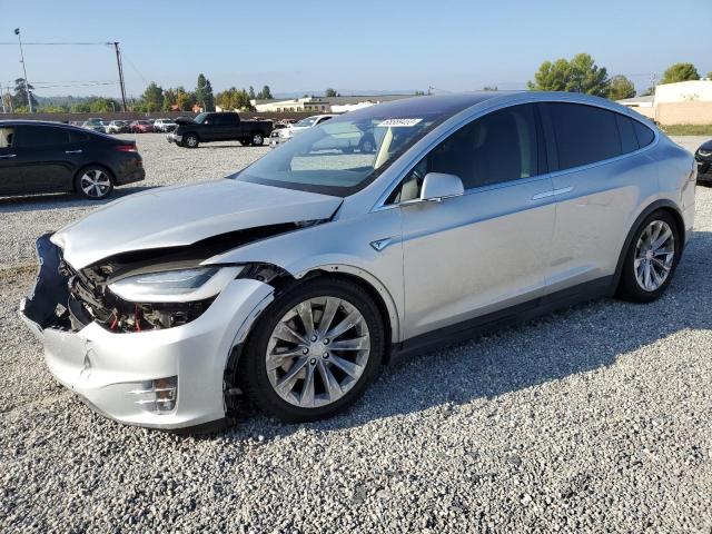 TESLA MODEL X 2016 with VIN 5YJXCBE24GF001658 - Photo from auction