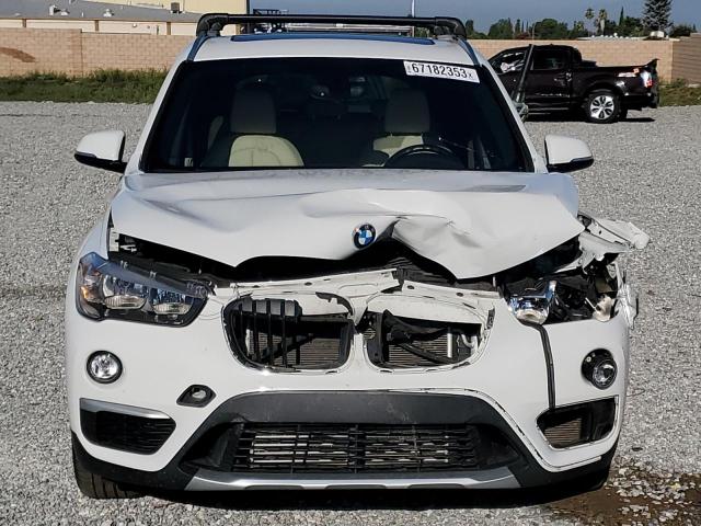 Photo 5 from auction – 2018 BMW X1 XDRIVE2 with VIN WBXHT3C31J5F93041