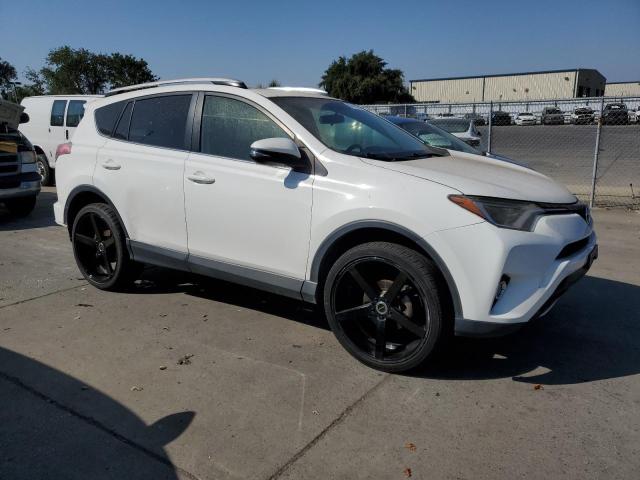 Photo 4 from auction – 2016 TOYOTA RAV4 XLE with VIN JTMWFREV5GJ076271