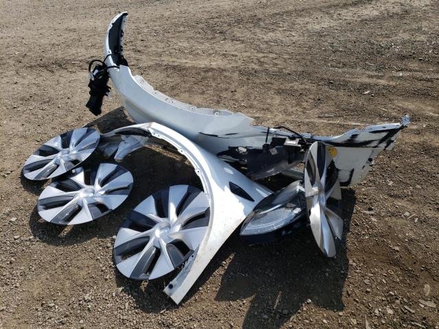 Photo 12 from auction – 2021 TESLA MODEL Y with VIN 5YJYGAEE4MF234934