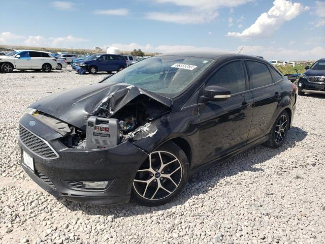 FORD FOCUS SE 2015 with VIN 1FADP3F24FL261152 - Photo from auction