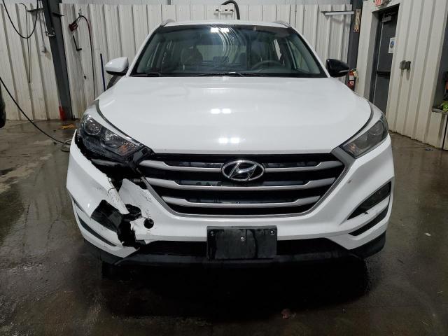 Photo 5 from auction – 2018 HYUNDAI TUCSON SEL with VIN KM8J3CA46JU767615