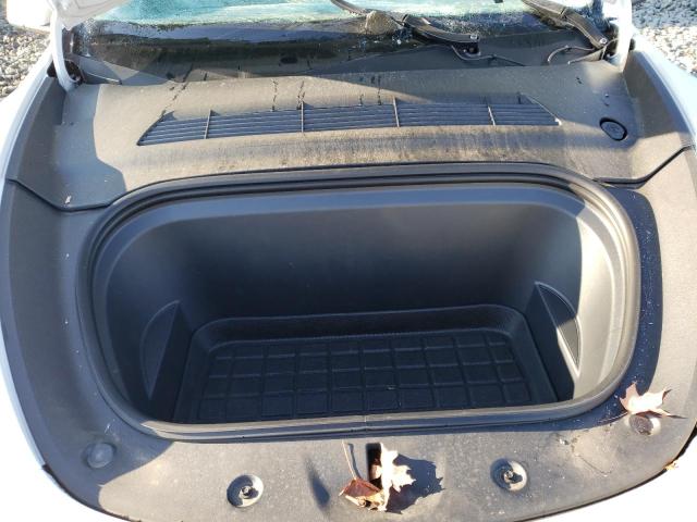 Photo 11 from auction – 2022 TESLA MODEL Y with VIN 7SAYGDEE7NF363918