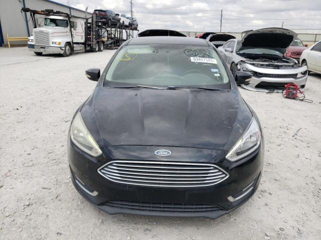 Photo 5 from auction – 2015 FORD FOCUS TITA with VIN 1FADP3J27FL240609