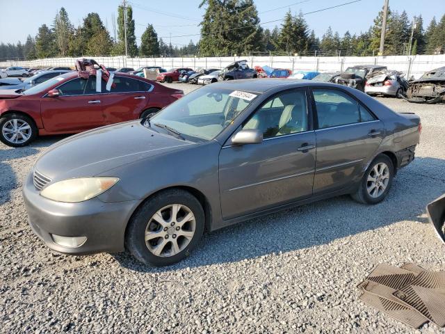 TOYOTA CAMRY LE 2005 with VIN 4T1BF30K65U594079 - Photo from auction