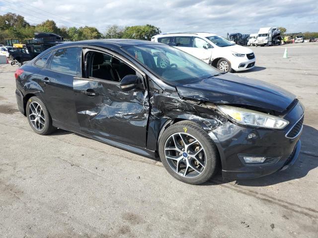 Photo 4 from auction – 2015 FORD FOCUS SE with VIN 1FADP3F28FL304231