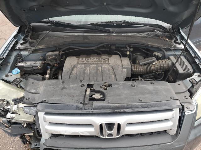 Photo 12 from auction – 2006 HONDA PILOT EX with VIN 2HKYF18526H560458